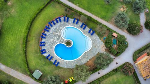an overhead view of a large swimming pool in a park at Sant'Anna Vicolo Aranci 5 in Portoferraio