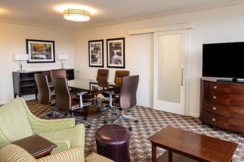 a room with a conference room with a table and chairs at Pittsburgh Marriott City Center in Pittsburgh