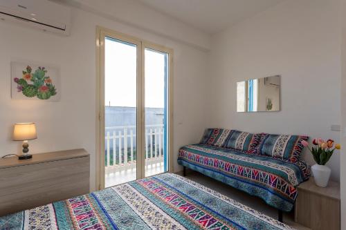 Ένα ή περισσότερα κρεβάτια σε δωμάτιο στο Onde