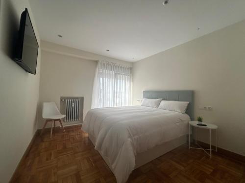 Postel nebo postele na pokoji v ubytování Llanes Suite VUT-6201-AS