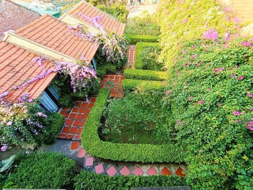 an aerial view of a garden with plants and flowers at Tam Coc Sunshine Homestay in Ninh Binh