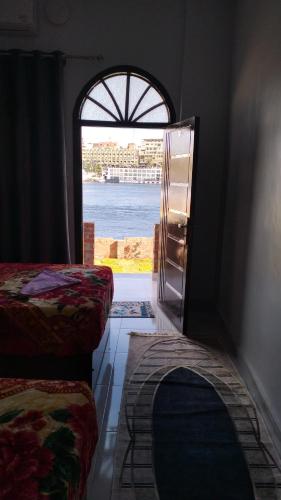 Katil atau katil-katil dalam bilik di Onaty Narty Guest house