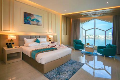 Postel nebo postele na pokoji v ubytování Concorde Creek View Hotel Bur Dubai