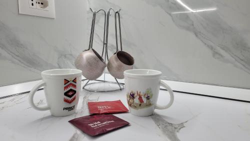 Set per la preparazione di tè e caffè presso Dream Luxury Apartment