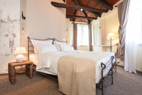 Ένα ή περισσότερα κρεβάτια σε δωμάτιο στο Hotel Angelo d'Oro