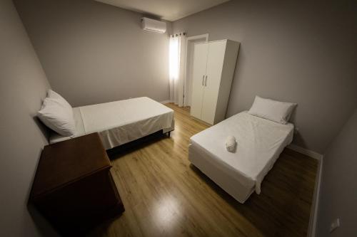 Una cama o camas en una habitación de Pousada Al Mare