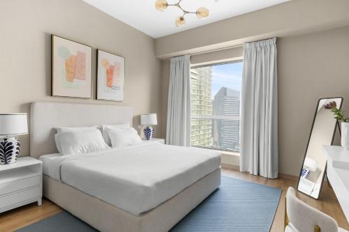 Postel nebo postele na pokoji v ubytování Rimal 1 - Jumeirah Beach Residence - Mint Stay