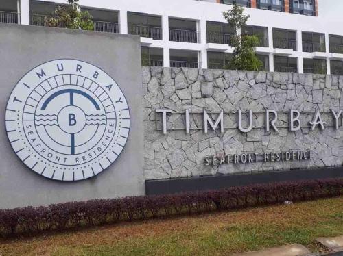 a sign for the tumour bay hospital in front of a building at TimurBay Seafront ZarZyra Suite in Kuantan