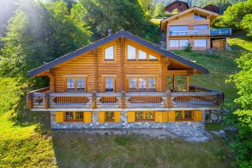 an aerial view of a log house at AlpenRose - 8 pers - avec cachet -pres des pistes in Plan Fey