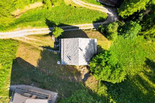 an overhead view of a building in the grass at AlpenRose - 8 pers - avec cachet -pres des pistes in Plan Fey