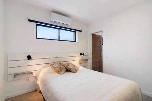 Postel nebo postele na pokoji v ubytování Apartamento Seashel