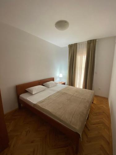 Postel nebo postele na pokoji v ubytování Apartment VaLi