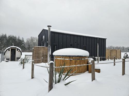 DOMKI POD DĘBAMI , Radawa en invierno