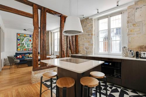 Ett kök eller pentry på Pick A Flat's Apartment in Opéra - Rue Saulnier