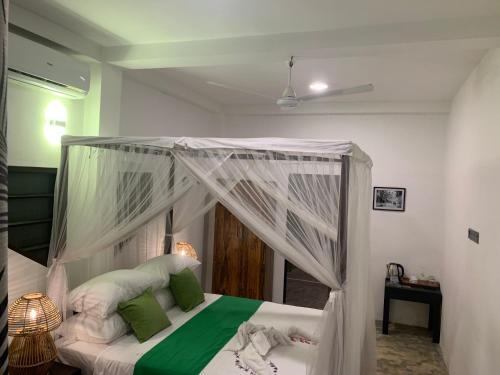 Ein Bett oder Betten in einem Zimmer der Unterkunft Samadhi Garden