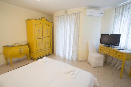 TV a/nebo společenská místnost v ubytování Casa Oasa - Boutique rooms, Gourmet Pizza & Cocktail Bar