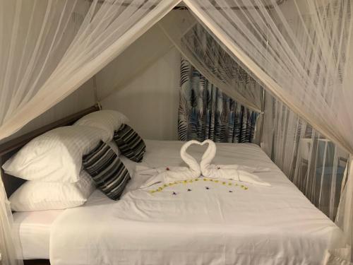 Ein Bett oder Betten in einem Zimmer der Unterkunft Samadhi Garden