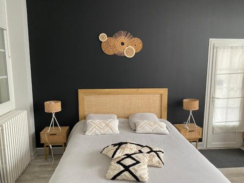 Ένα ή περισσότερα κρεβάτια σε δωμάτιο στο Les Cottages de la Norge