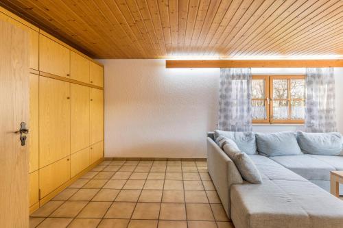 a living room with a couch and a table at Ferienhaus Toni in Hohenstein