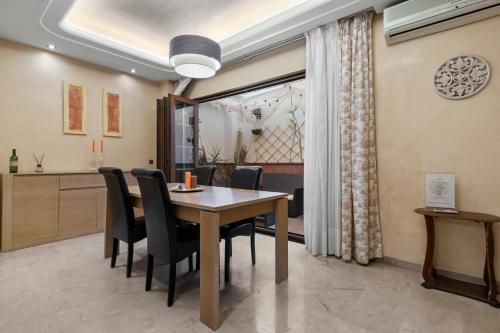 a dining room with a table and chairs at Villa Soler House in Malaga by Costarentals - MAL03 in Málaga