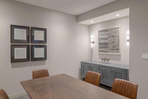 a dining room with a table and chairs at TownePlace Suites by Marriott Framingham in Framingham