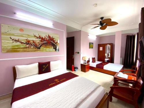 Postel nebo postele na pokoji v ubytování Hong Ha Airport Hotel