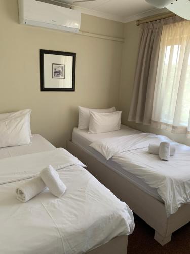 Postel nebo postele na pokoji v ubytování Hotel Thule