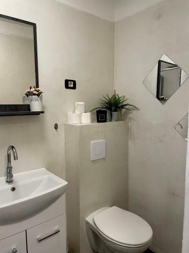 Ένα μπάνιο στο Apartments Nina