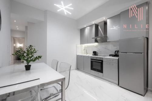Filoxenia Living, Nilie Hospitality MGMT