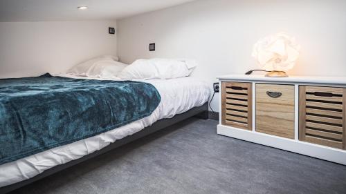 Кровать или кровати в номере Smart Confort 17 - Appartement confort et stylé