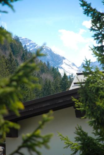 a view of a mountain from under a bridge at Style Hotel Grifone in Madonna di Campiglio