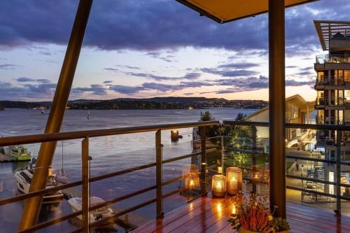 a view of the water from the balcony of a cruise ship at Large 41 millions kr Apartment - seaview in center in Oslo