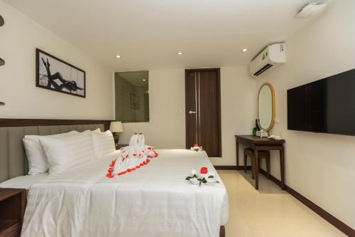 Ένα ή περισσότερα κρεβάτια σε δωμάτιο στο Blubiz Hotel 8