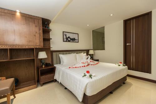 Ένα ή περισσότερα κρεβάτια σε δωμάτιο στο Blubiz Hotel 8