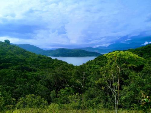 a view of a lake in the mountains at Paseos en Velero en Angra dos Reis in Angra dos Reis