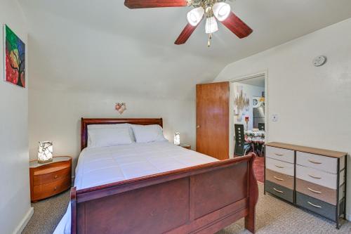 a bedroom with a bed and a ceiling fan at Mount Vernon Getaway - 4 Mi to the Bronx Zoo! in New Rochelle