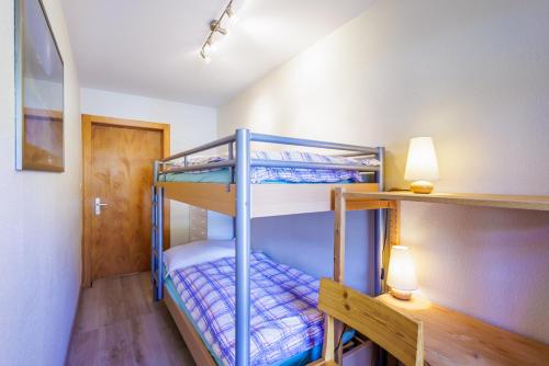 Ένα ή περισσότερα κρεβάτια σε δωμάτιο στο Les Platanes I1 - 6 pers - centre station