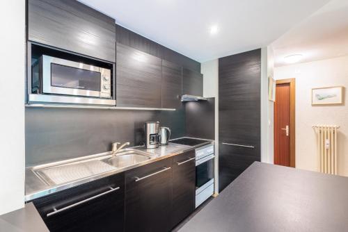 Køkken eller tekøkken på Bietschhorn 48 - 4 pers - piscine