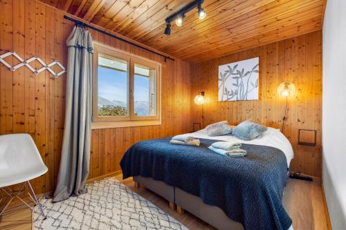 Tempat tidur dalam kamar di Silverfox - 6 pers - belle vue