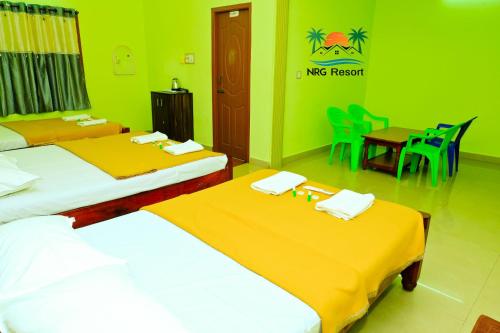 Postel nebo postele na pokoji v ubytování NRG Resort