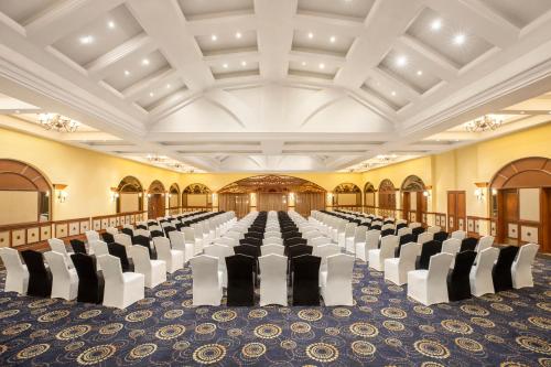 a large room with rows of chairs in it at Taj Exotica Resort & Spa, Goa in Benaulim