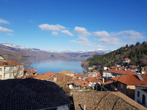 a view of a town with a lake and mountains at Sam Casa Luxury Living in Kastoria