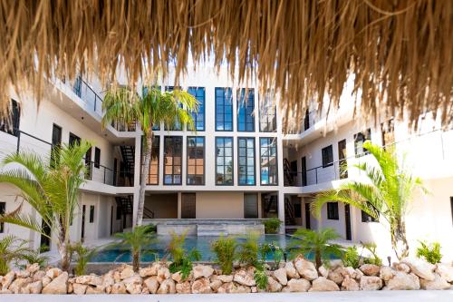an external view of the resort from the beach at Hotel Macondo Estilo Holbox in Holbox Island