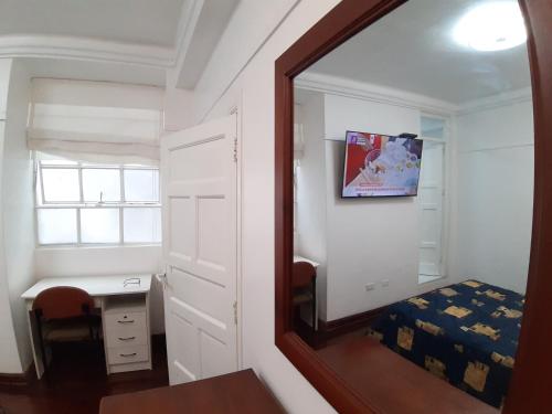 TV a/nebo společenská místnost v ubytování APARTAMENTO LINDO - A 2 Cuadras de la Plaza de Armas y del Palacio de Gobierno