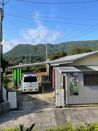 a white van parked in front of a house at Yoka House - Vacation STAY 46247v in Tokunoshima