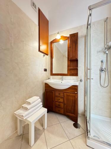 a bathroom with a sink and a shower at ART SUITE NEL CUORE DI PORTICI in Portici