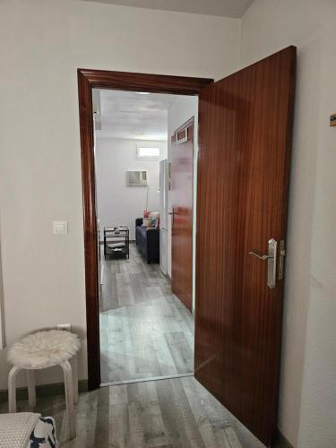 a door leading to a hallway with a room at Apartamentos La Mar in Altea