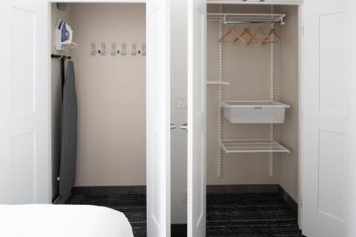 a room with a closet with a white door at TownePlace Suites by Marriott Olympia in Olympia