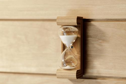 an open wooden box with an hourglass in it at Apartmán Bruno so saunou in Demanovska Dolina
