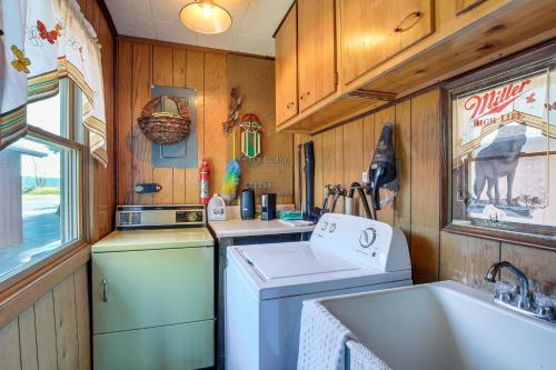 A kitchen or kitchenette at Cozy Markesan Cabin about 2 Mi to Green Lake Access!